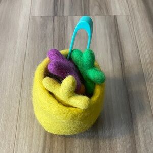 Lovevery felt basket with felt stars and tongs